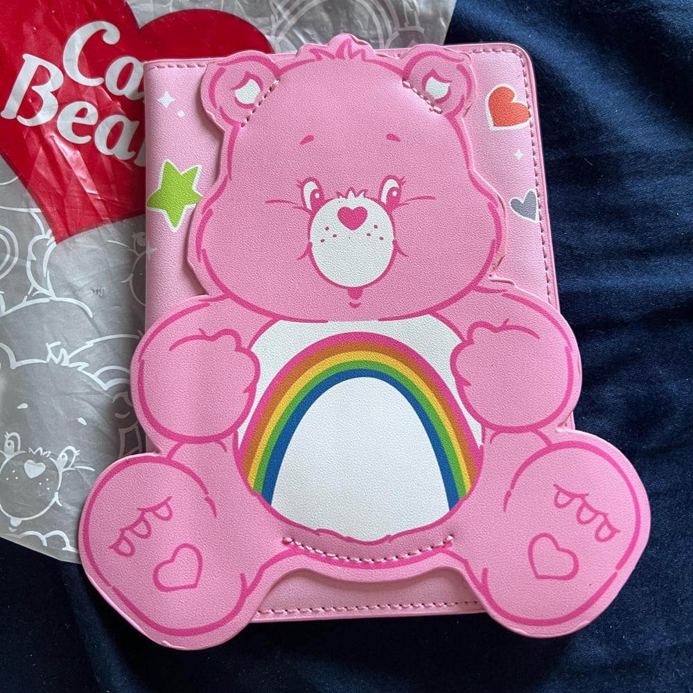 Care Bears pink passport cover with rainbow